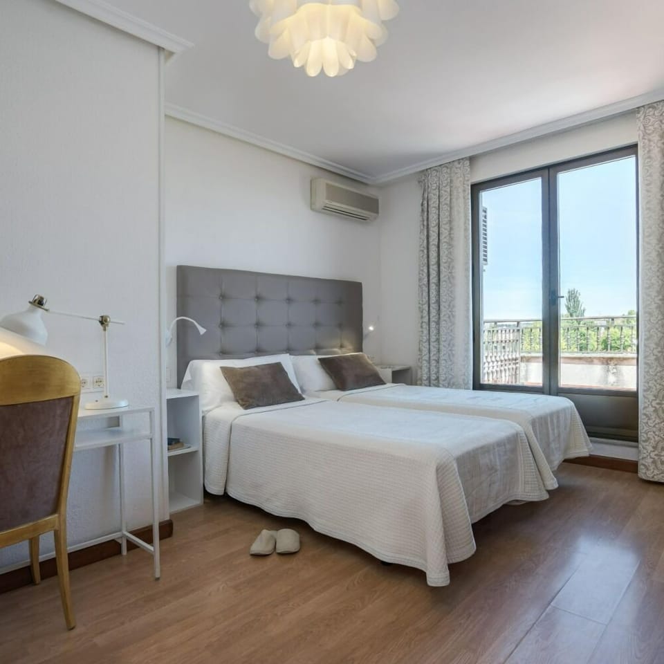Superior Triple Room, Balcony | Minibar, in-room safe, blackout drapes, iron/ironing board