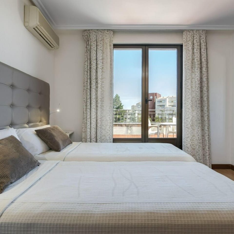 Superior Triple Room, Balcony | Minibar, in-room safe, blackout drapes, iron/ironing board