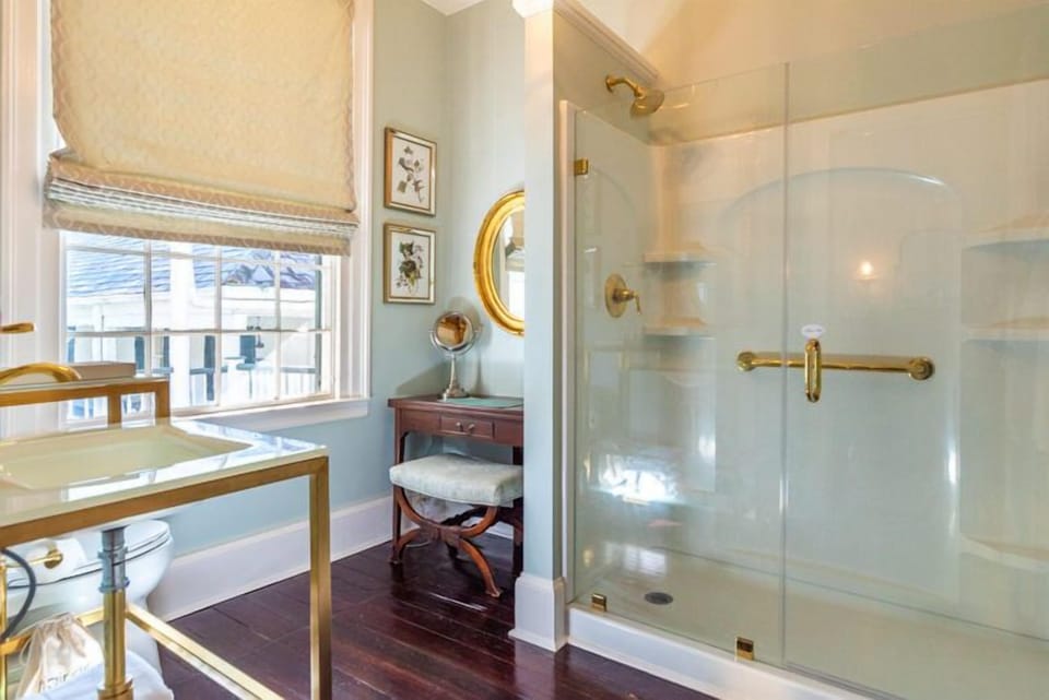 The Marjorie Room | Bathroom | Combined shower/tub, rainfall showerhead, designer toiletries, towels
