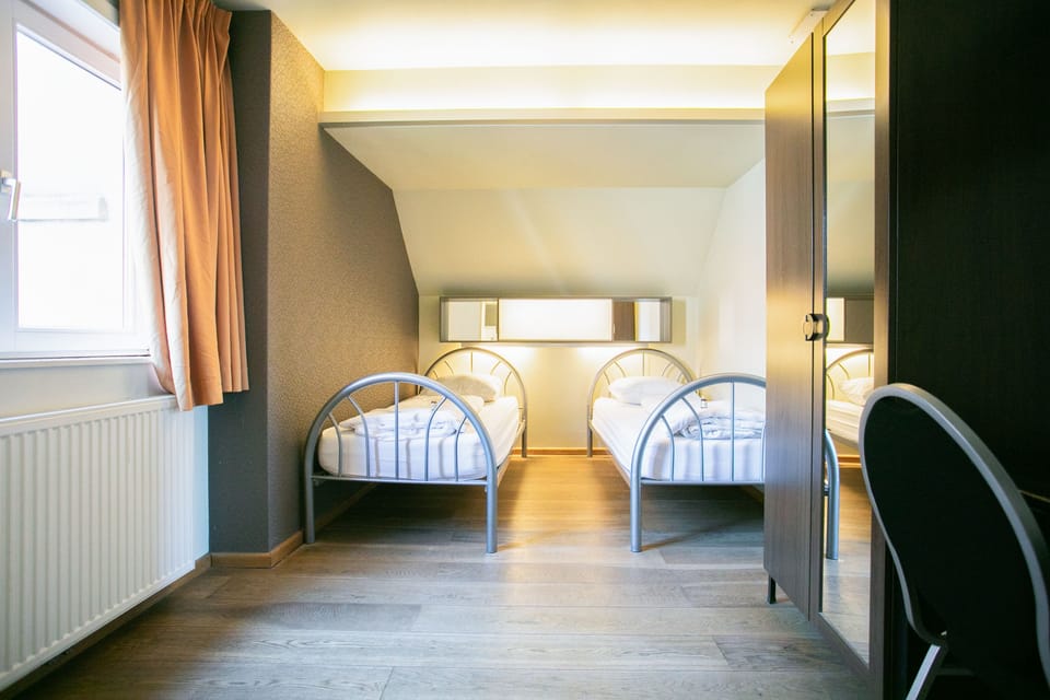 Twin Room, Private Bathroom | Free WiFi, bed sheets