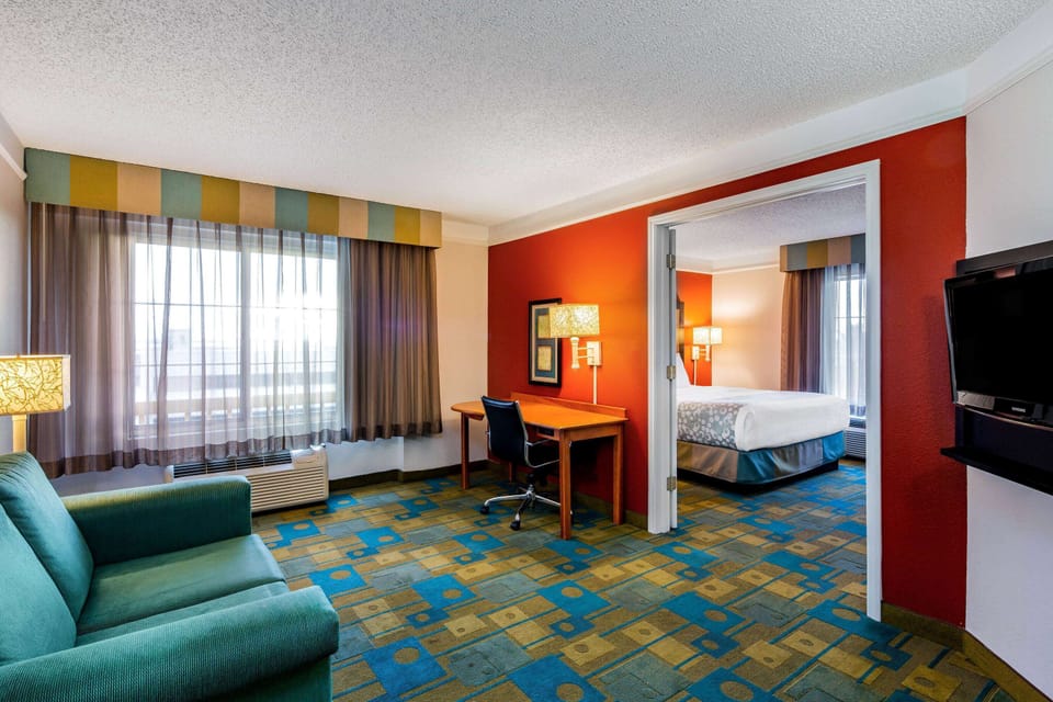 Suite, 1 King Bed, Non Smoking | Premium bedding, desk, laptop workspace, blackout drapes