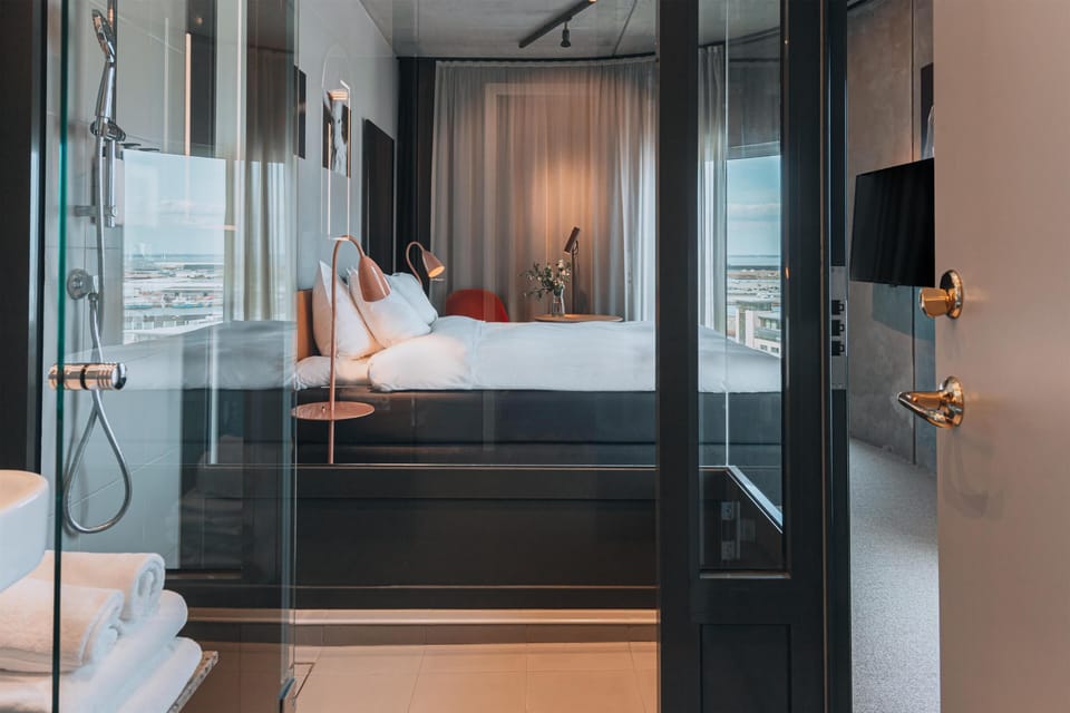 Deluxe Room, 1 King Bed, Ocean View | Bathroom | Designer toiletries, hair dryer, towels, soap