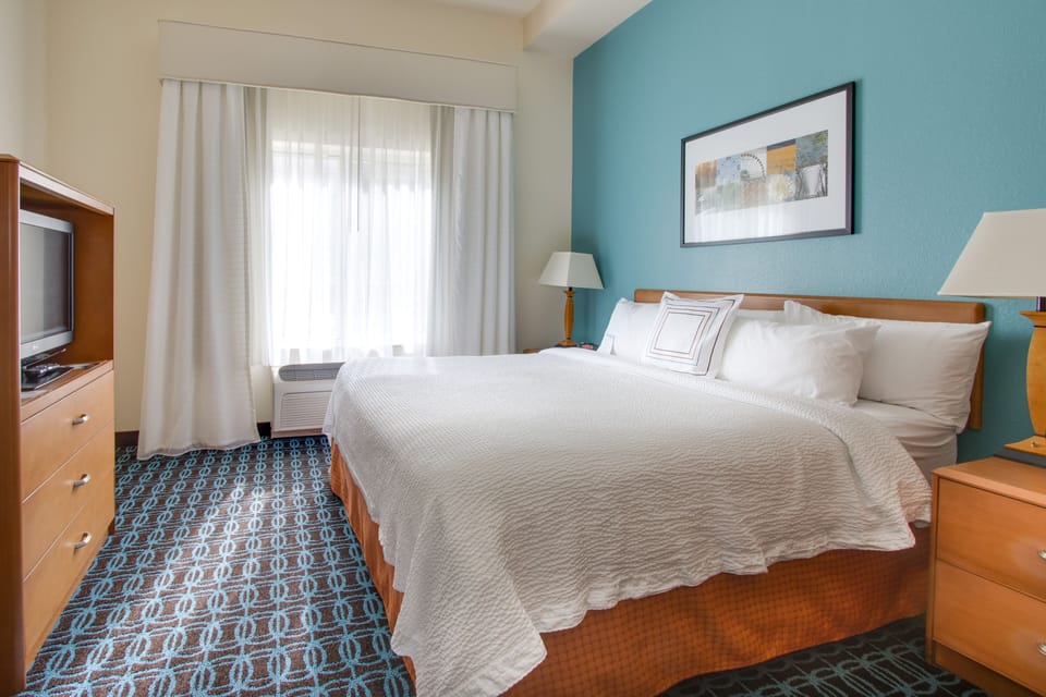 Premium bedding, pillowtop beds, desk, laptop workspace