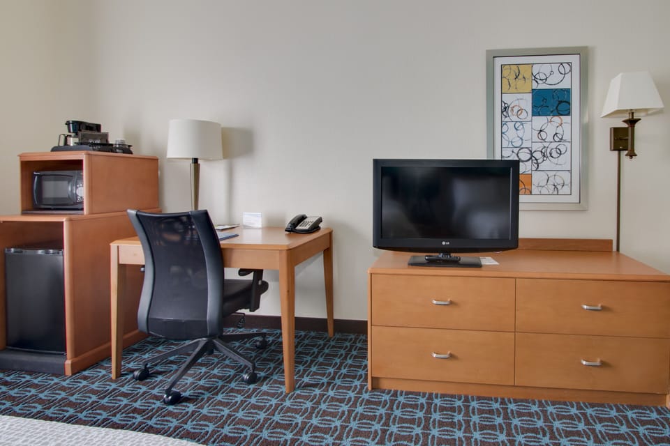 Premium bedding, pillowtop beds, desk, laptop workspace