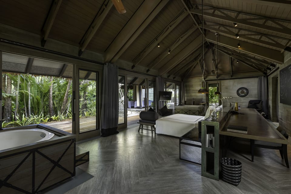 Two Bedroom Family Pool Villa | Minibar, in-room safe, desk, iron/ironing board