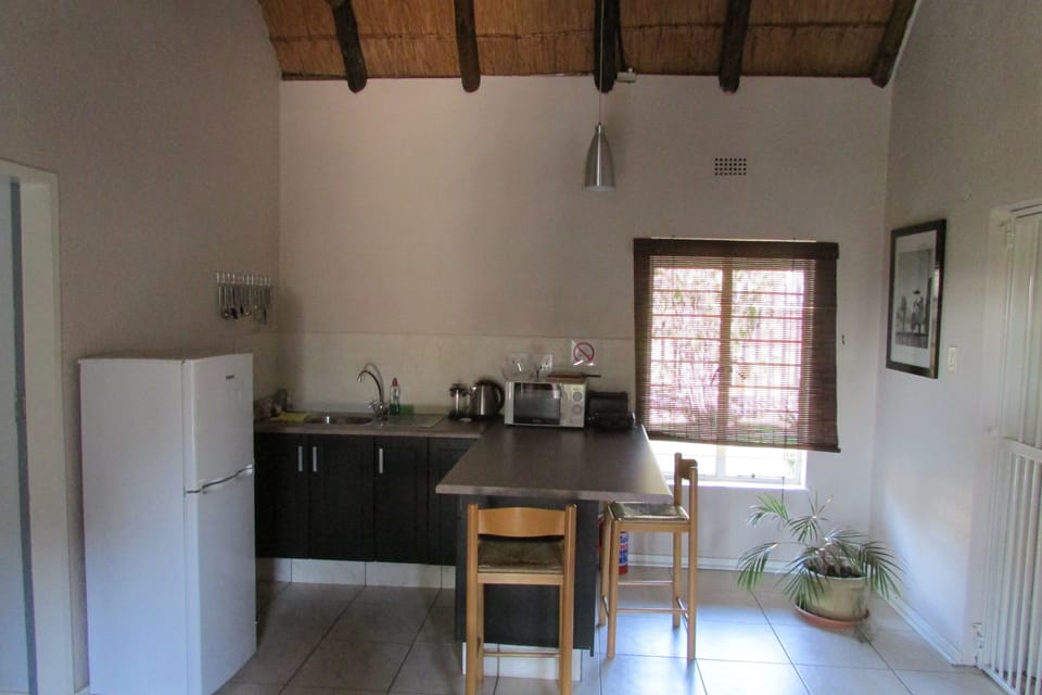 Standard House, 1 Bedroom (Acacia House) | Private kitchenette | Full-size fridge, microwave, coffee/tea maker, cookware/dishes/utensils