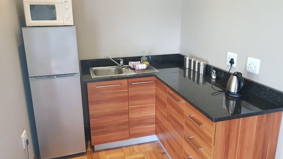 Coffee/tea maker, fridge, microwave, electric kettle