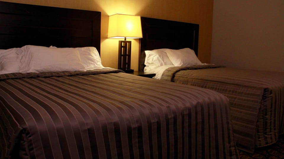 Deluxe Room, 2 Double Beds | Blackout drapes, iron/ironing board, free WiFi, bed sheets