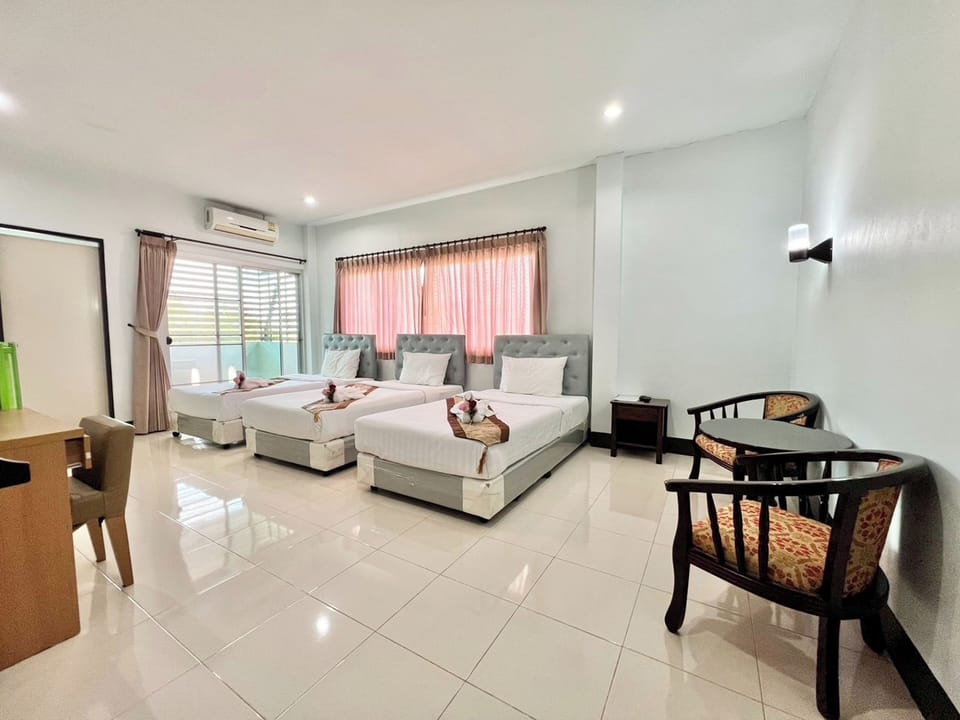 Triple Room | Desk, blackout drapes, free WiFi, bed sheets
