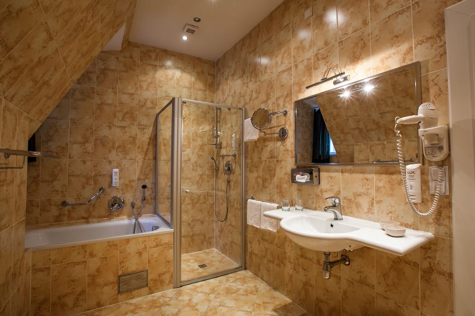 Deluxe Double or Twin Room, City View | Bathroom amenities | Combined shower/tub, free toiletries, hair dryer, bathrobes