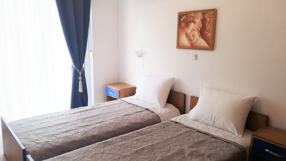 Deluxe Apartment, 1 Bedroom, Garden Area | 1 bedroom, minibar, in-room safe, soundproofing