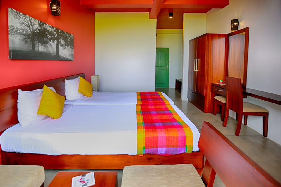 Deluxe Triple Room, Hill View | Minibar, desk, iron/ironing board (on request), WiFi (free)