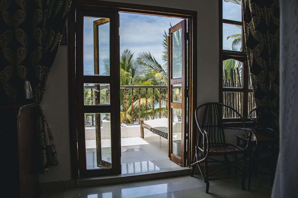 Deluxe Triple Room, Multiple Beds, Terrace, Ocean View | In-room safe, desk, soundproofing, free WiFi