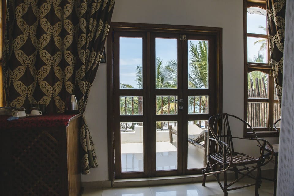 Deluxe Triple Room, Multiple Beds, Terrace, Ocean View | In-room safe, desk, soundproofing, free WiFi