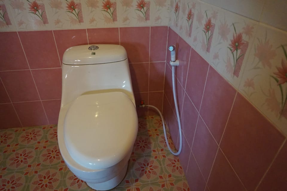 Thai House | Bathroom | Shower, free toiletries, towels