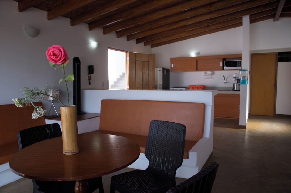 Bungalow, Kitchenette, Pool View | Living area | 40-inch flat-screen TV with cable channels, TV
