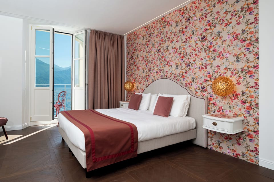 Deluxe Room, Balcony, Lake View | Down comforters, minibar, in-room safe, desk