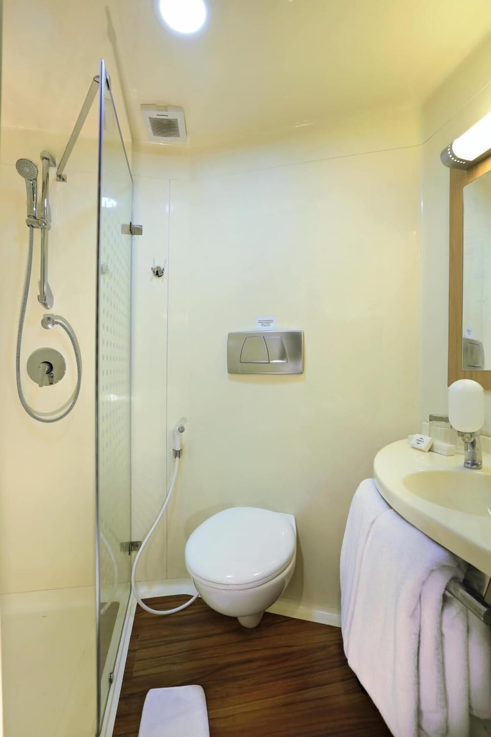 Shower, free toiletries, slippers, towels