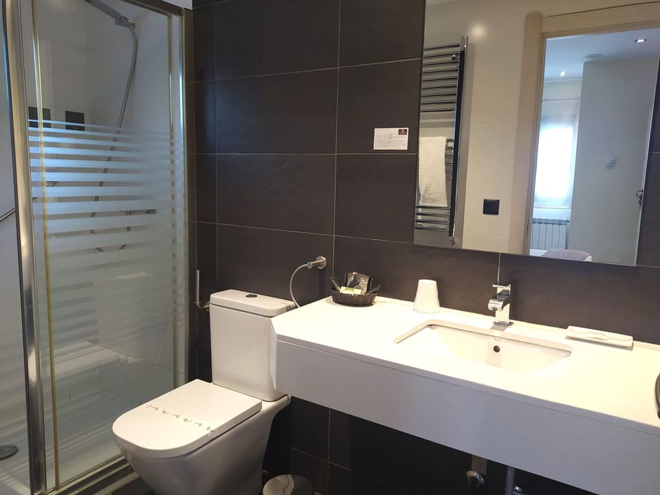 Double room with living room, 1 double bed and 1 sofa bed | Bathroom | Shower, free toiletries, hair dryer, towels