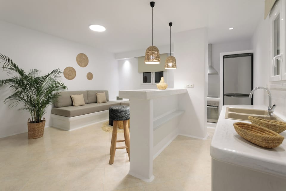 Two Bedroom Grand Family Suite | Living area | 43-inch plasma TV with satellite channels, TV
