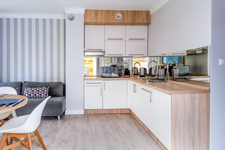 Apartment, 1 Bedroom | Private kitchen | Fridge, microwave, coffee/tea maker, electric kettle