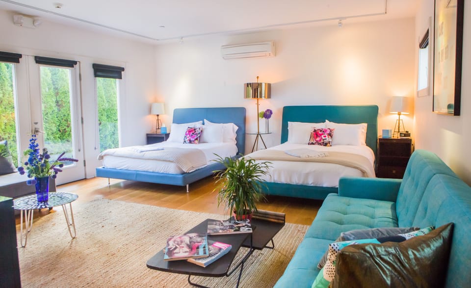 Garden Suite, Wheelchair Accessible, Ground Floor, 2 Queen Beds, Non-Smoking | Premium bedding, minibar, soundproofing, iron/ironing board
