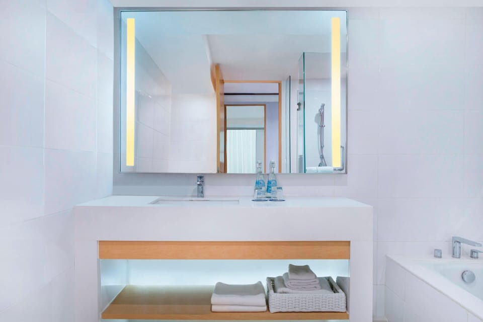 Suite, 1 Bedroom | Bathroom | Free toiletries, hair dryer, bathrobes, slippers