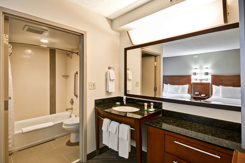 Designer toiletries, hair dryer (on request), towels