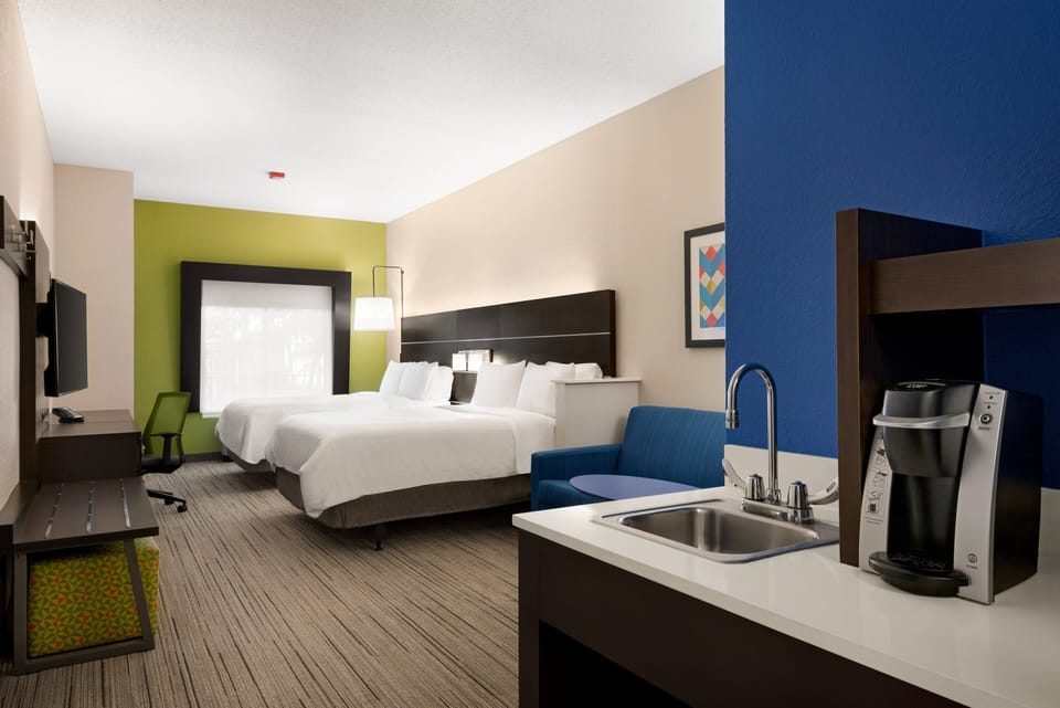 Suite, 2 Queen Beds (Living Area) | In-room safe, desk, iron/ironing board, free WiFi