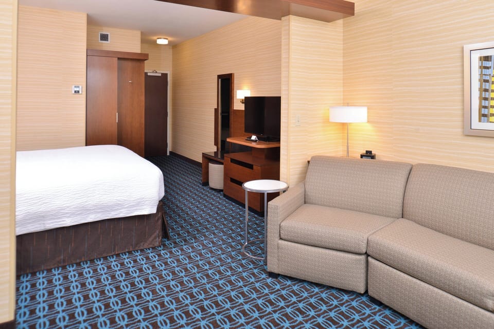 Hypo-allergenic bedding available, in-room safe, desk, laptop workspace