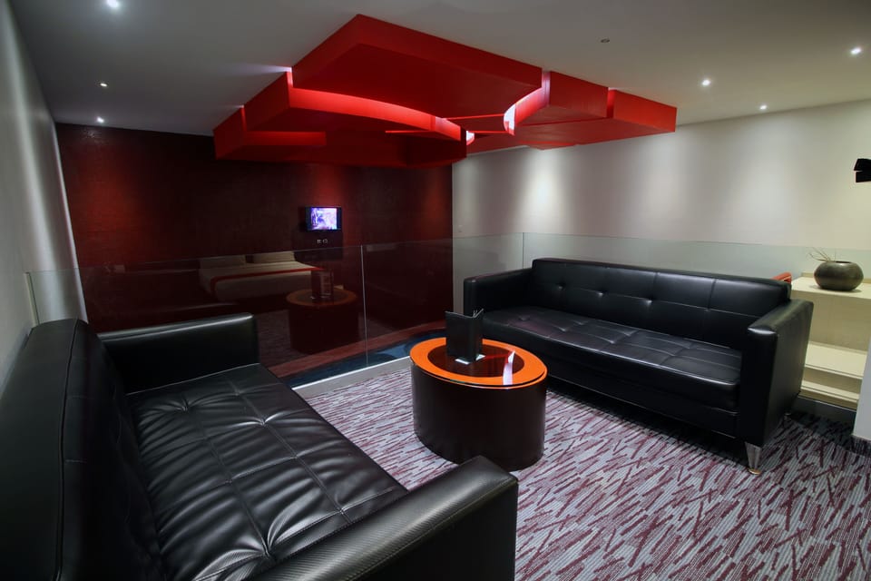 Suite, 1 King Bed, Private Pool | Living area | Flat-screen TV