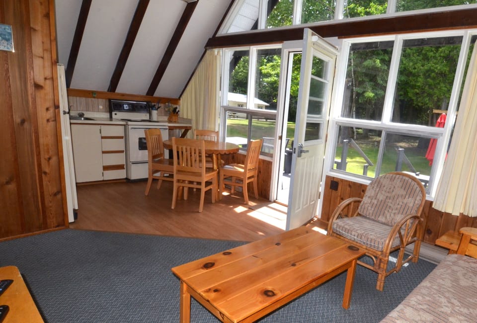 Chalet, 3 Bedrooms | Living area | 32-inch TV with satellite channels