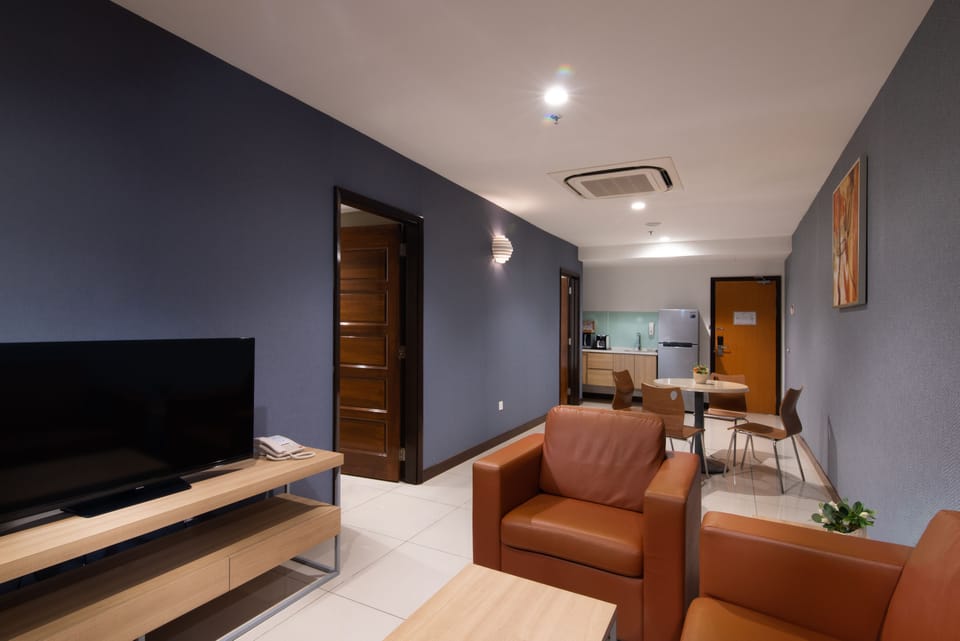 Family Apartment, 2 Bedrooms | Living area | 40-inch flat-screen TV with satellite channels, TV