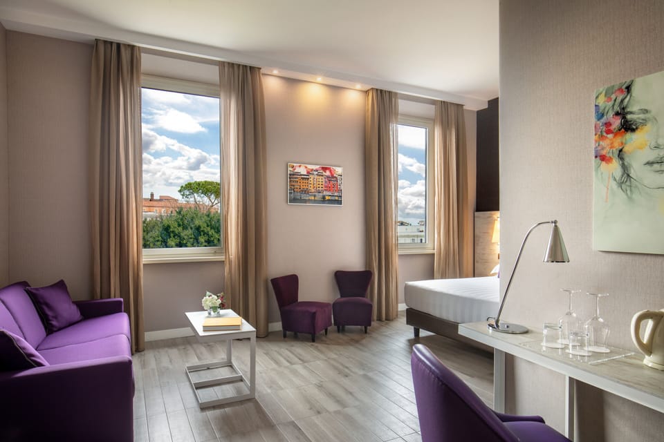 Family Room | Premium bedding, in-room safe, desk, blackout drapes