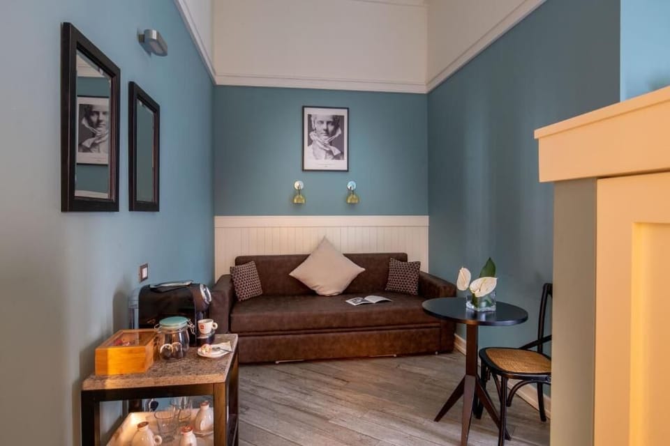 Deluxe Double Room | Living area | Flat-screen TV