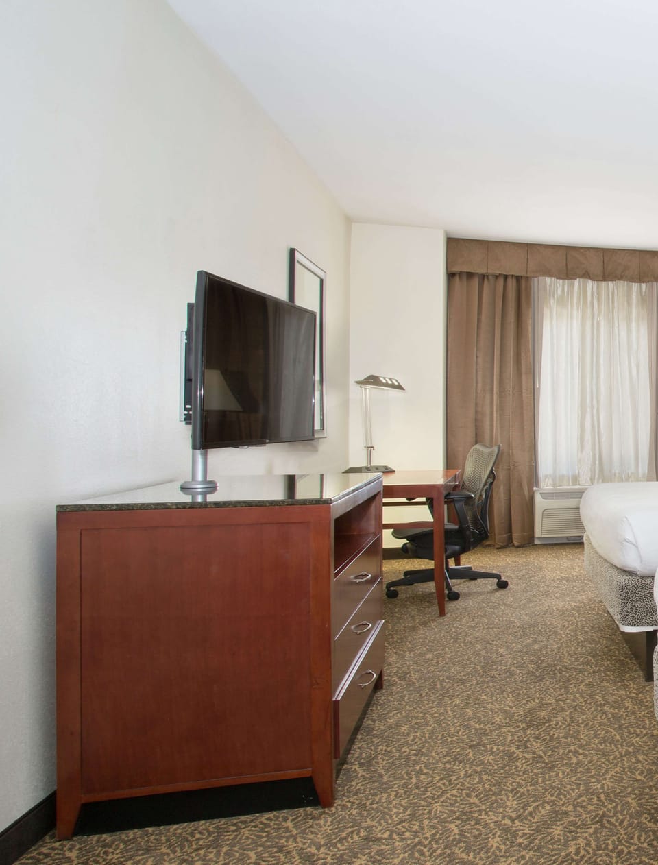 Desk, laptop workspace, blackout drapes, iron/ironing board