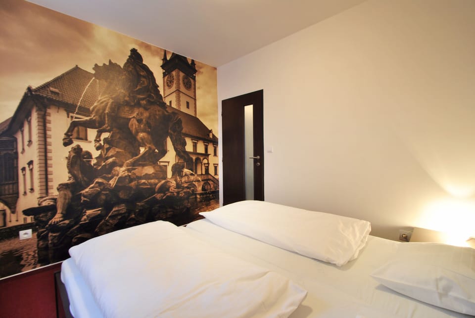 Apartment, 1 Bedroom (3 Adults) | In-room safe, desk, blackout drapes, iron/ironing board
