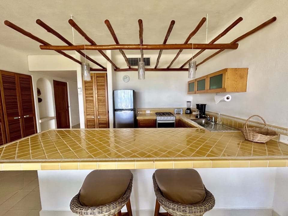 Suite, 2 Bedrooms, Ocean View | Private kitchen | Full-size fridge, microwave, stovetop, coffee/tea maker