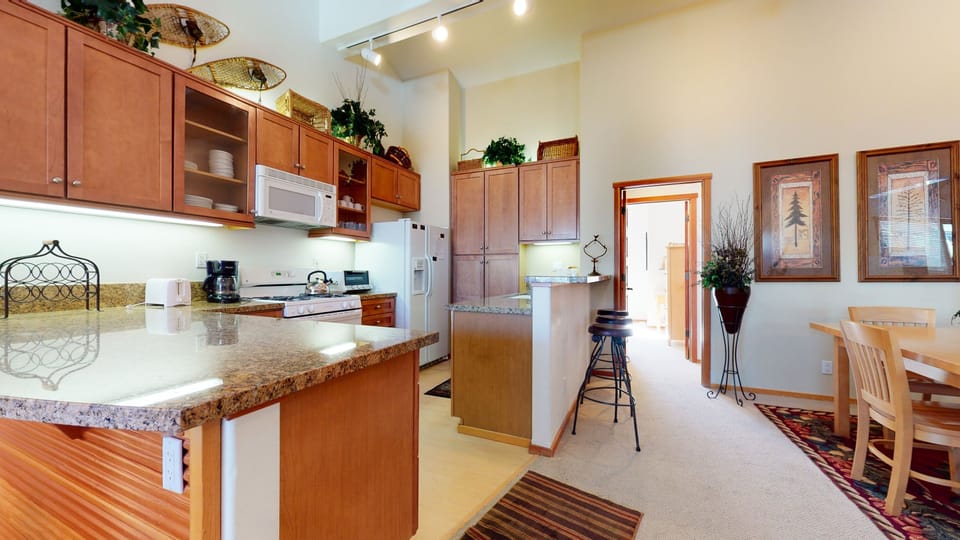 Condo, 2 Bedrooms | Private kitchen | Fridge, microwave, oven, dishwasher