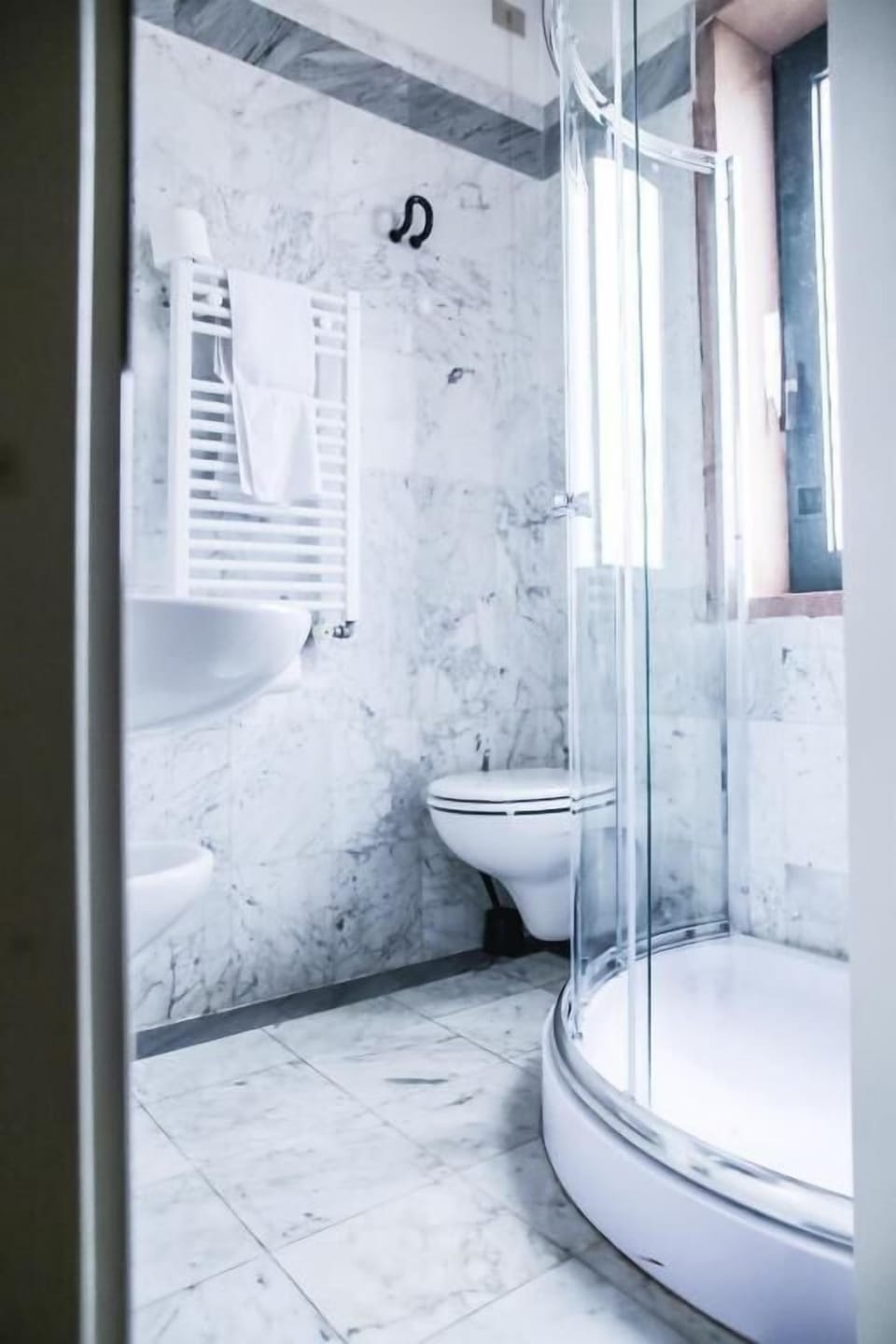 Hair dryer, slippers, bidet, towels