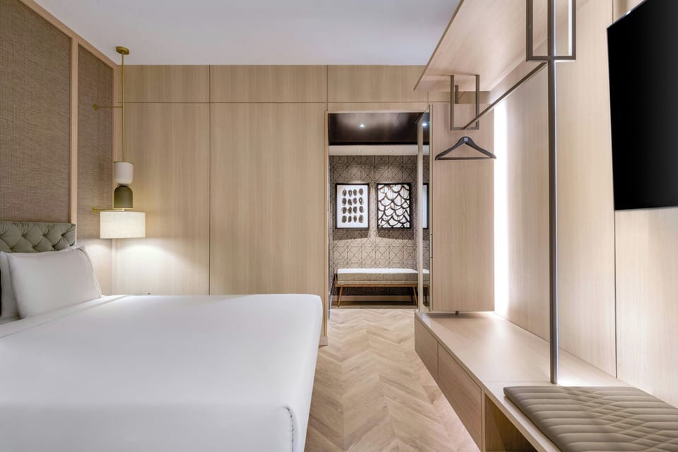 Premium bedding, down comforters, minibar, in-room safe
