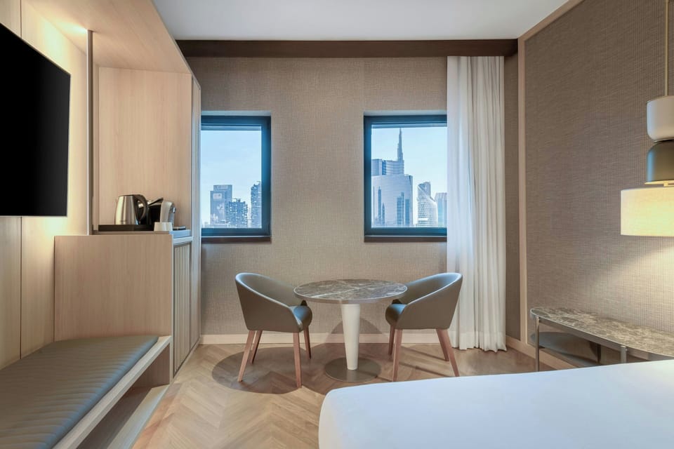 Room, 1 King Bed, City View | Premium bedding, down comforters, minibar, in-room safe
