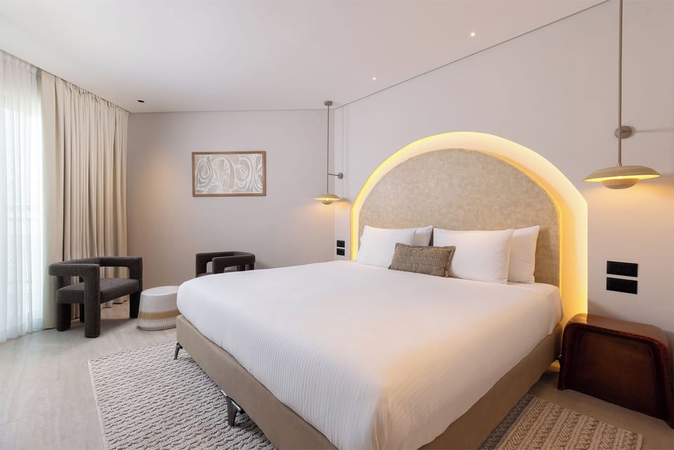Royal Premium Suite | Minibar, in-room safe, desk, iron/ironing board