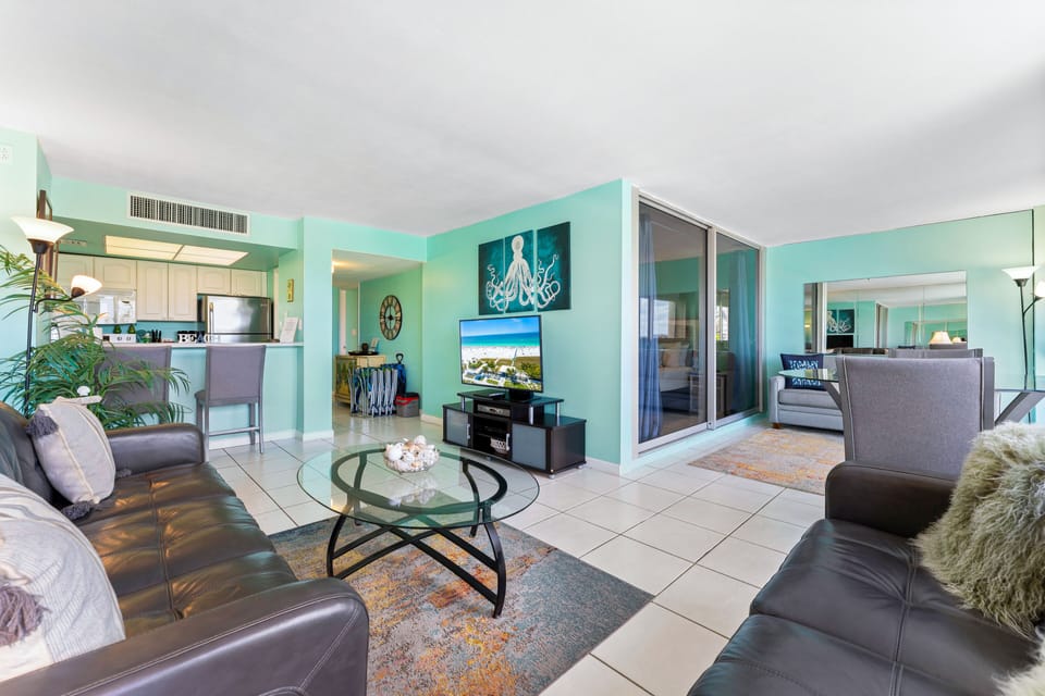 Premium Condo, Multiple Beds, Tower | Living area | TV
