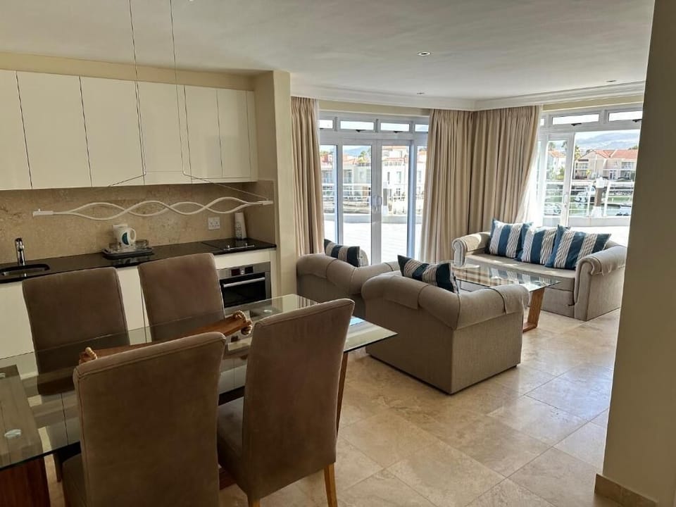Self Catering Suite Marina view | Living area | Flat-screen TV