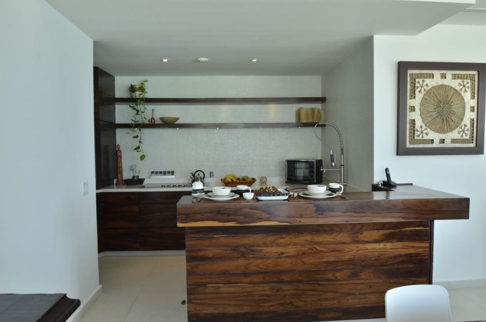 Elite Suite, 3 Bedrooms, Oceanfront | Private kitchen | Full-size fridge, microwave, oven, stovetop