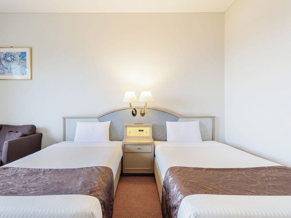 Ocean View Standard Twin room(Non-smoking) | Desk, bed sheets