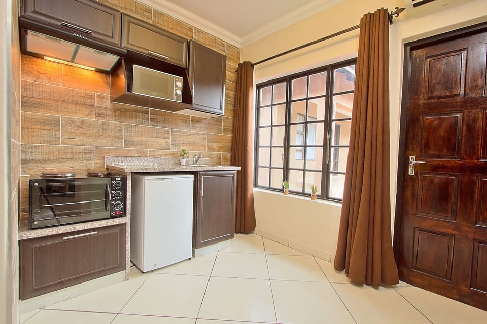 Luxury Self-Catering | Private kitchenette | Dining tables