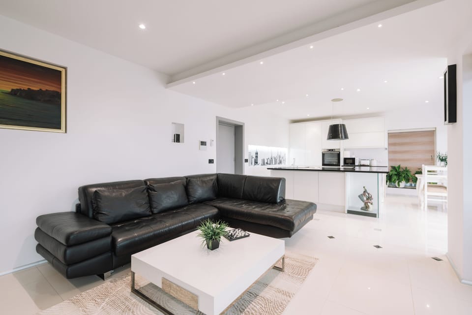 Superior Apartment | Living area | Flat-screen TV