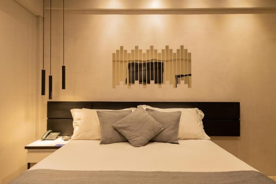 Standard Double Room, 1 Double Bed (Super) | Minibar, blackout drapes, iron/ironing board, free WiFi